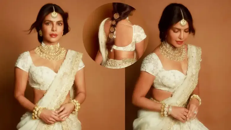 प्रियांका चोप्रा तिच्या हाफ-साडी स्टाइलच्या पांढऱ्या लेहेंग्याने प्रभावित करते, मोत्यांचे दागिने आणि एक आकर्षक स्मित.