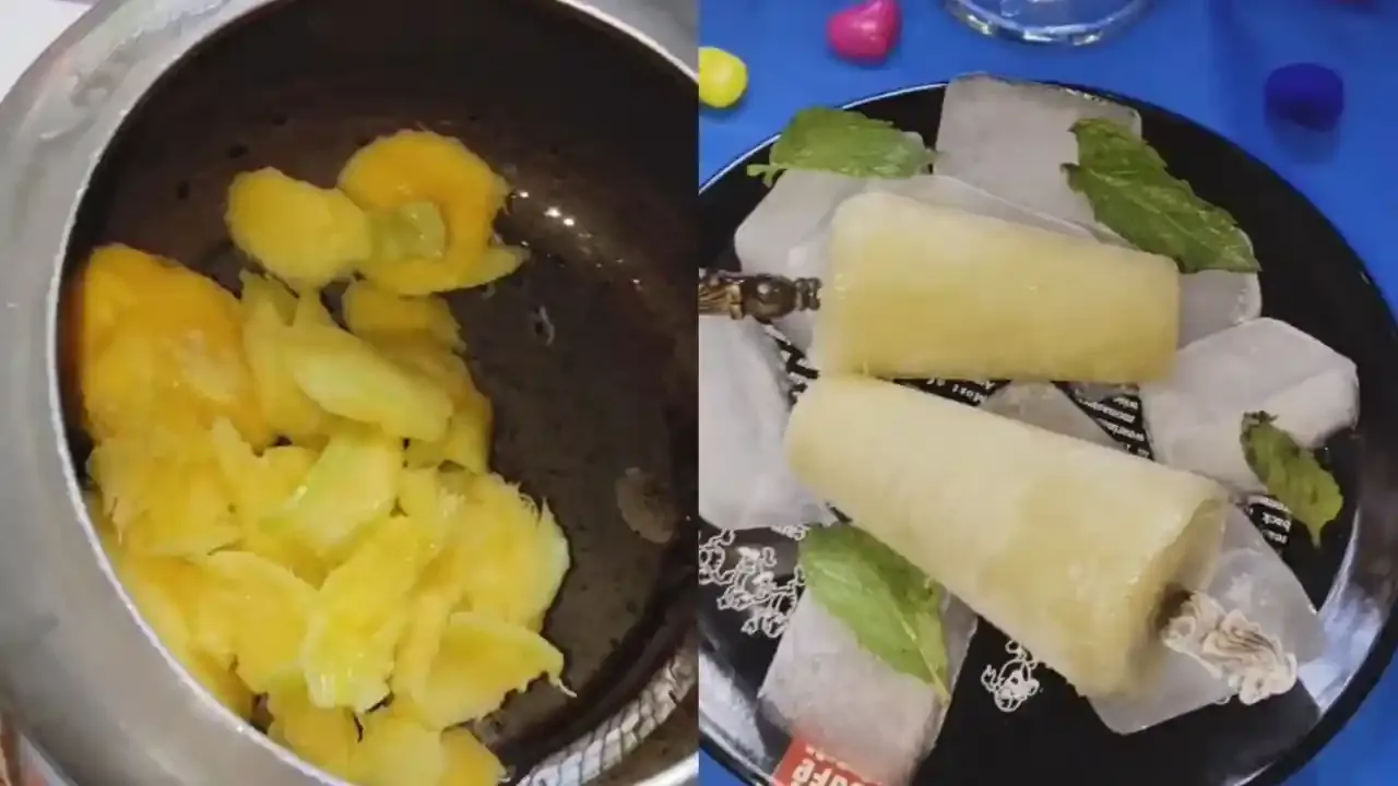 एका धातूच्या भांड्यात ताजे कापलेले आंबे पुदिन्याच्या पानांसह बर्फावर सर्व्ह केलेले घरगुती आंबा मिंट पॉप्सिकल्स बरोबर.
